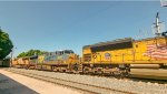 CSX ES40DC Locomotive leading a train